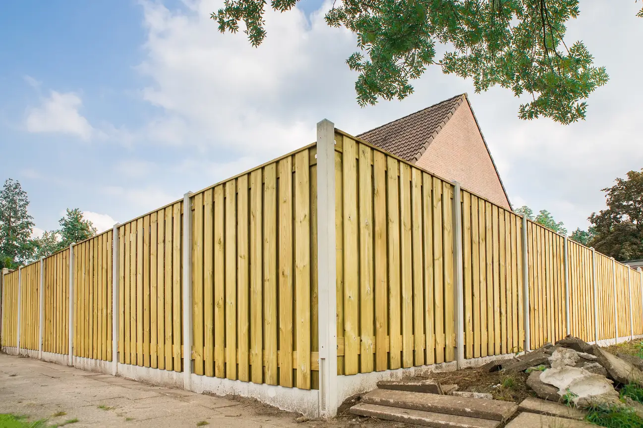 Tall timber fence with concrete posts built by Builders Silverdale fencing contractors.