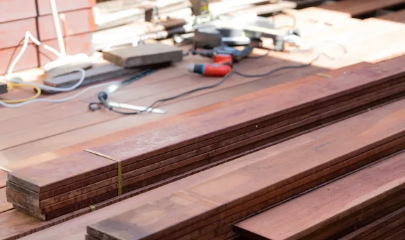 Deck Timber Ready for Installation – Builders Silverdale Deck Builders Timber decking boards and tools prepared for installation by Builders Silverdale’s professional deck builders