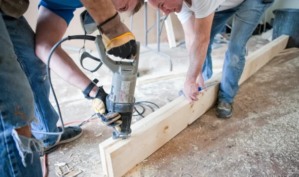 Builders Silverdale team collaborating during structural framing as part of detailed home renovations