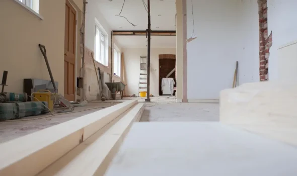 Ongoing home renovations project with exposed framing and layout planning by Builders Silverdale professionals