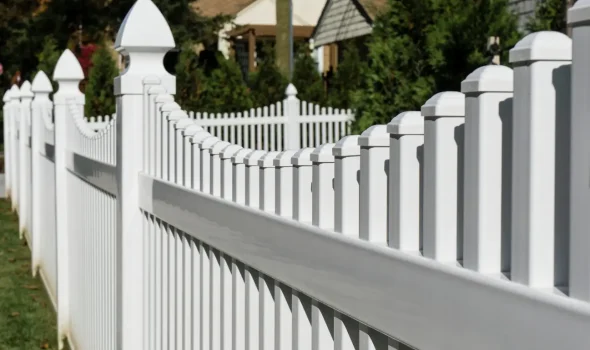 White decorative fencing crafted by expert fencing contractors from Builders Silverdale.